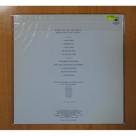 PAUL YOUNG - BETWEEN TWO FIRES - LP