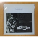 PAUL YOUNG - BETWEEN TWO FIRES - LP